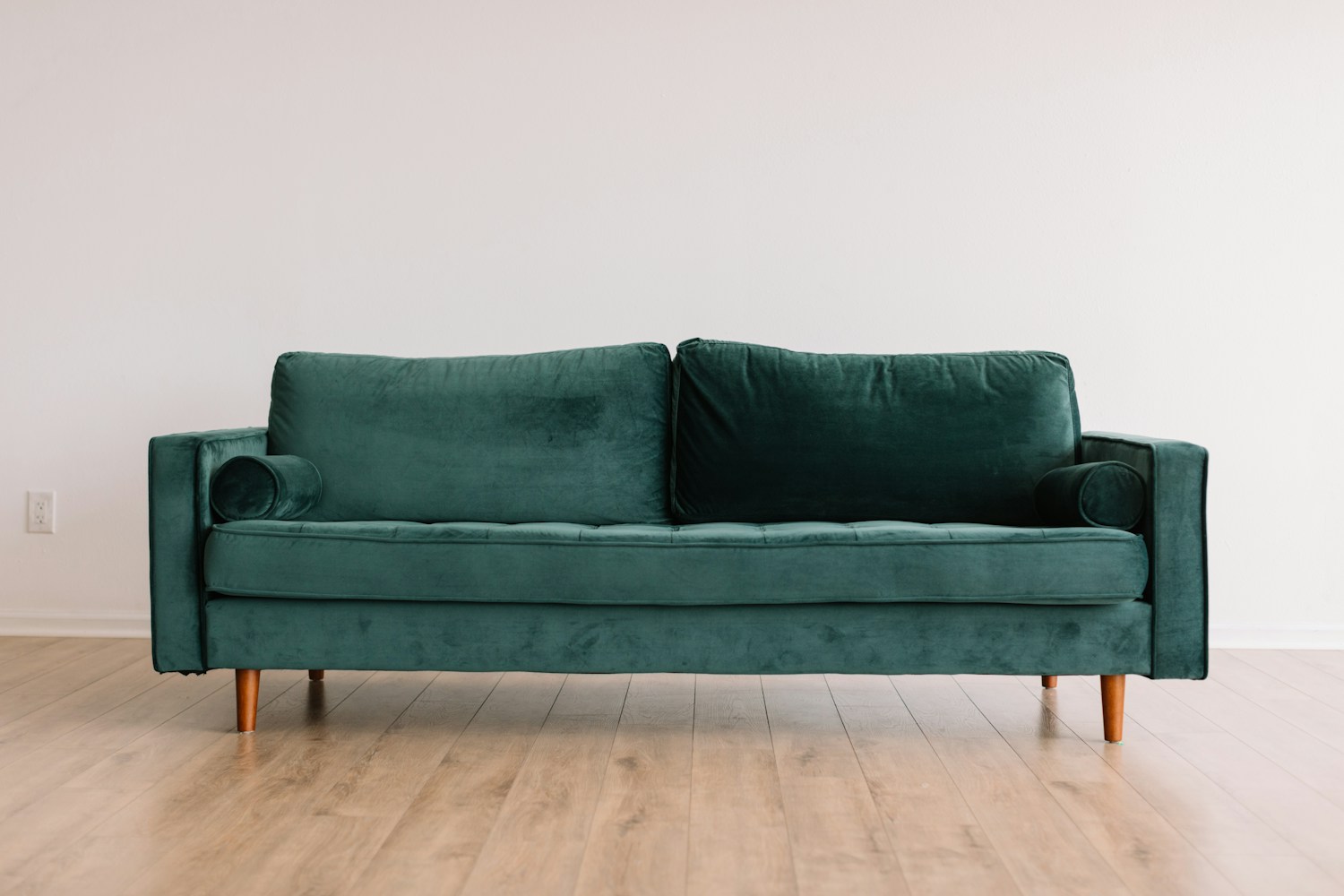 Green three-seat sofa